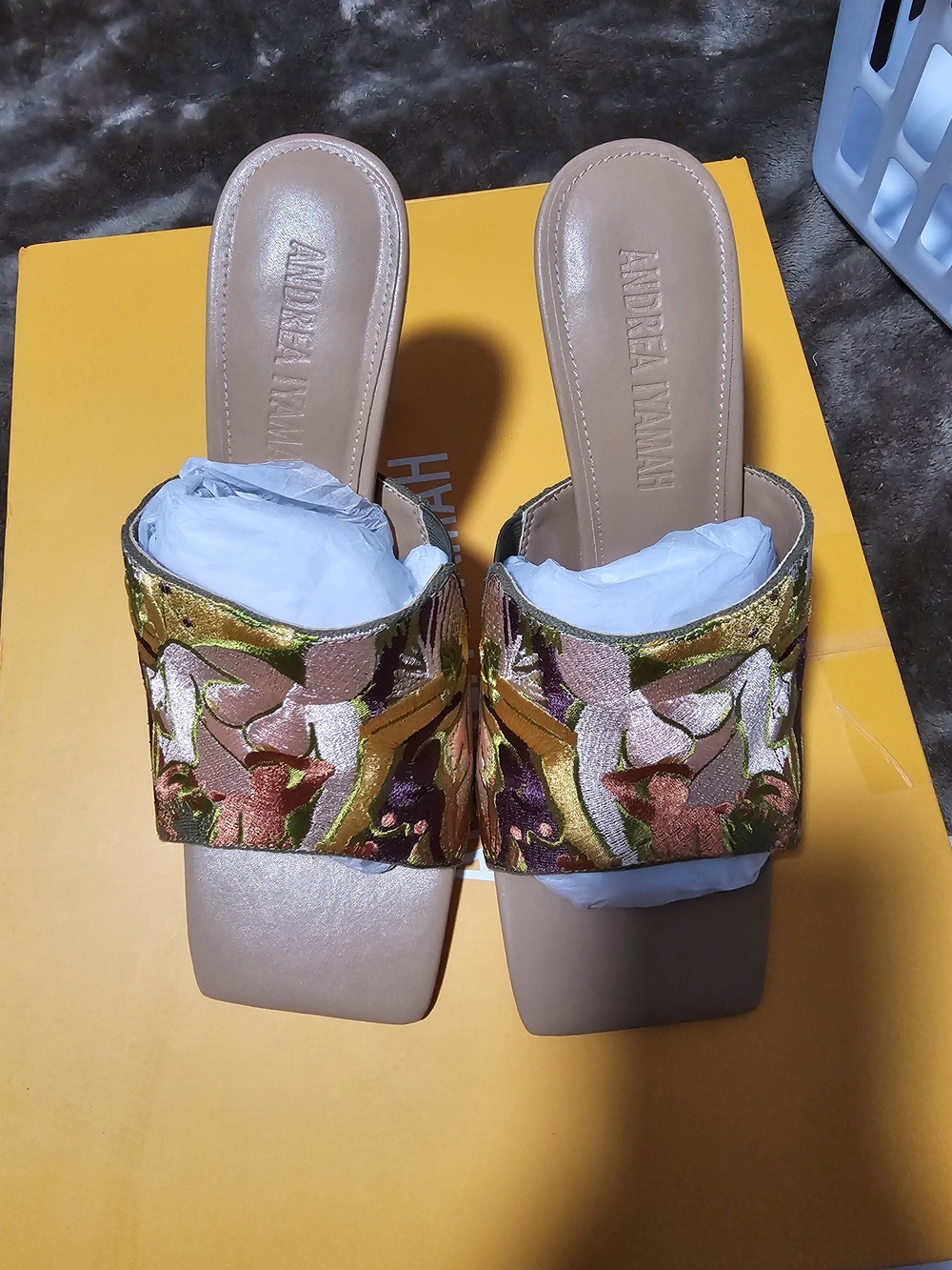Andrea Iyamah floral embroidered mules featuring a wide strap